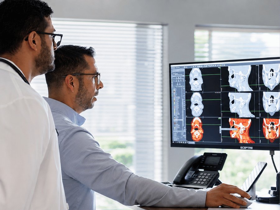 New Mexico Cancer Center imaging team reviewing medical imaging